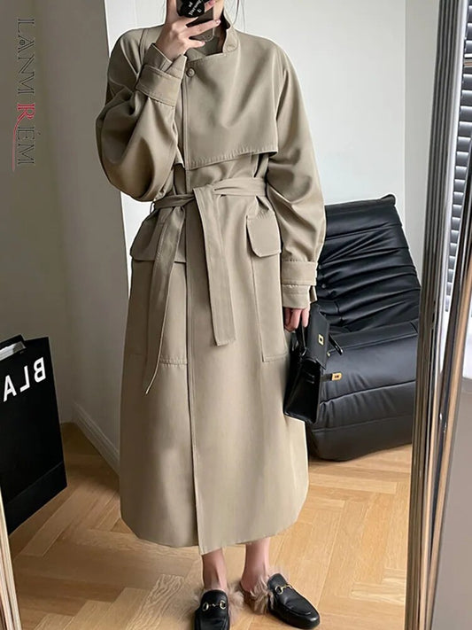 [LANMREM] Elegant Lace-up Design Long Trench For Women Solid Lapel Spliced Simplicity Female Overcoat 2023 Autumn New Clothing